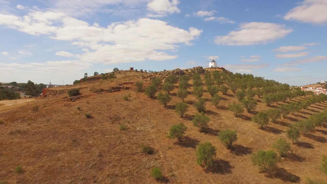 Aerial view of a windmill on a hilltop in Portugal