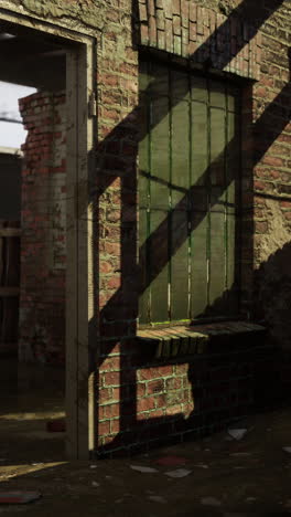 abandoned building with brick wall, window and door