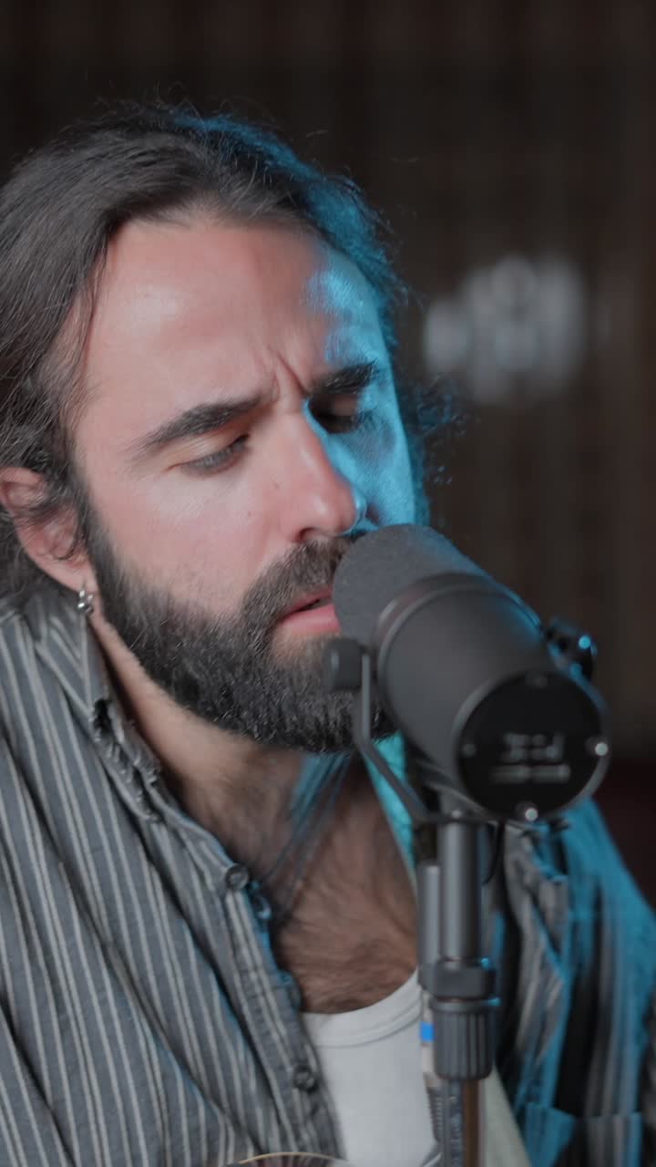 Musician Playing Acoustic Guitar and Singing