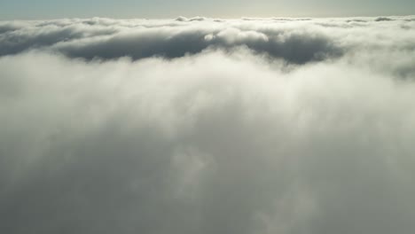 drone above cloudscape on a sunny late afternoon