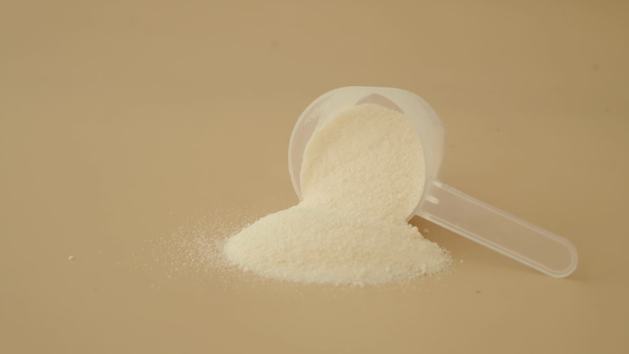 Scoop di polvere di proteine
