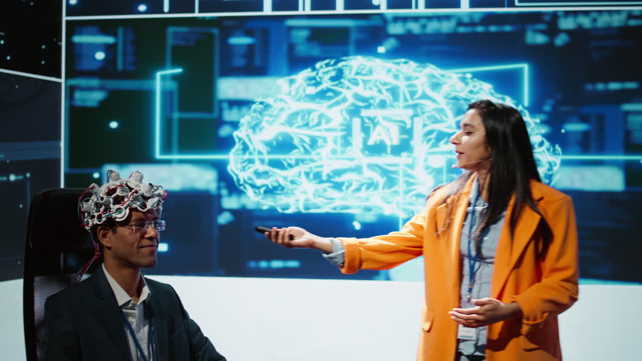 Speaker does EEG headset presentation during tech convention