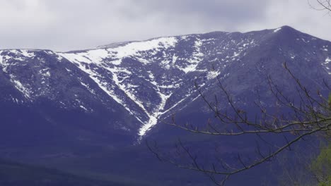snow topped mt. katahdin from a distance