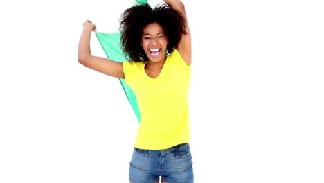pretty girl in yellow tshirt cheering at camera