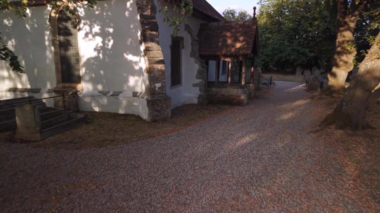 All Saints Church in Tolleshunt Knights, Essex England, United Kingdom, Pull Back Drone View