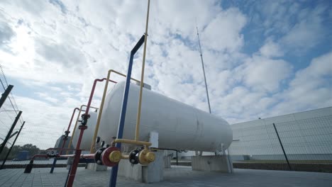 gas distribution station. industrial facility. gas processing station with pipes on a summer day in an open space. gas supply. transportation of natural gas through pipes.