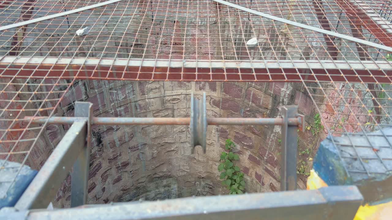fully restored clean and covered well in india, hand-dug wells are a traditional water source in India, particularly in rural areas.