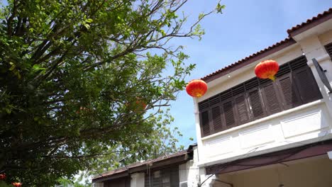 red lantern hanging at old heritage house george town