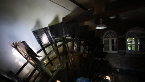 old water mill wheel with slight camera movement