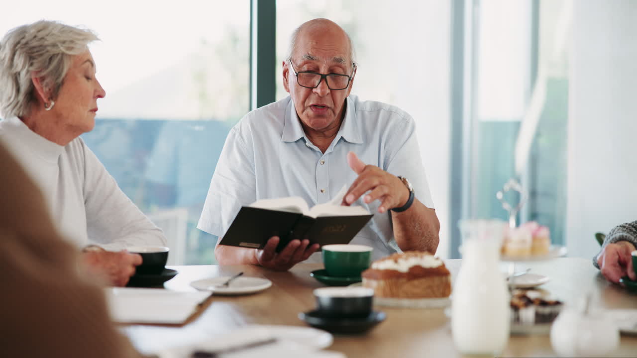 Elderly People Reading at a Table