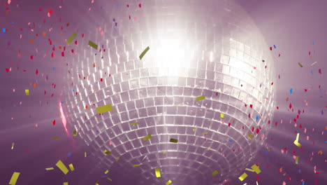 animación de confeti dorado cayendo sobre una bola de discoteca brillante