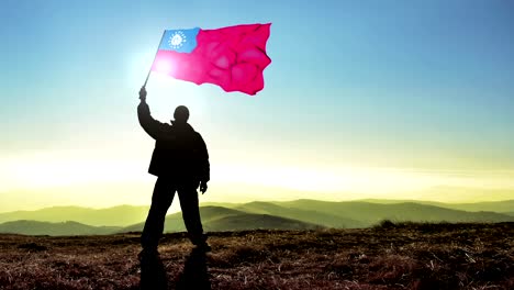 successful silhouette man winner waving myanmar flag on top of the mountain peak, cinemagraph loop background