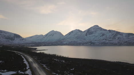 Drone-shot-panning-right-across-Norwegian-mountains-and-lakes