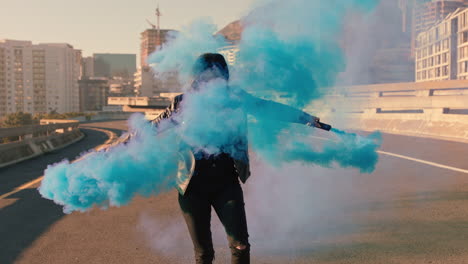 girl dancing with blue smoke grenade in city young woman dancer celebrating creative expression with hip hop dance in street slow motion