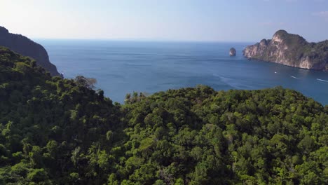 Aguas-Turquesas-Que-Rodean-Una-Isla-Tropical-Con-Exuberante-Vegetación-Verde-En-Tailandia