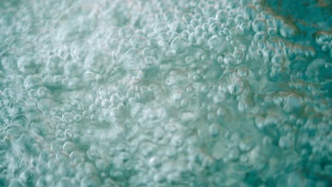 close up view of water bubbles on a flowing fresh water surface