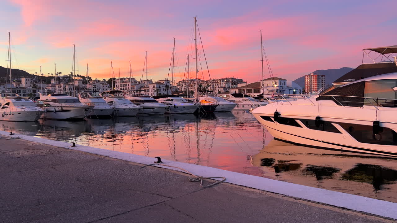 Beautiful Sunset over a Marina Filled with Yachts