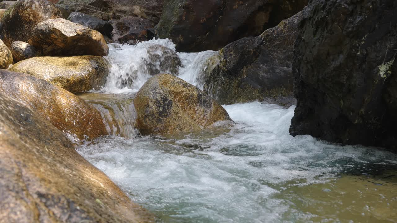 A clear stream in the valley, Flowing streams, clear and pure water resources