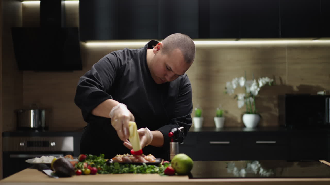 Chef Preparing Gourmet Food in a Modern Kitchen