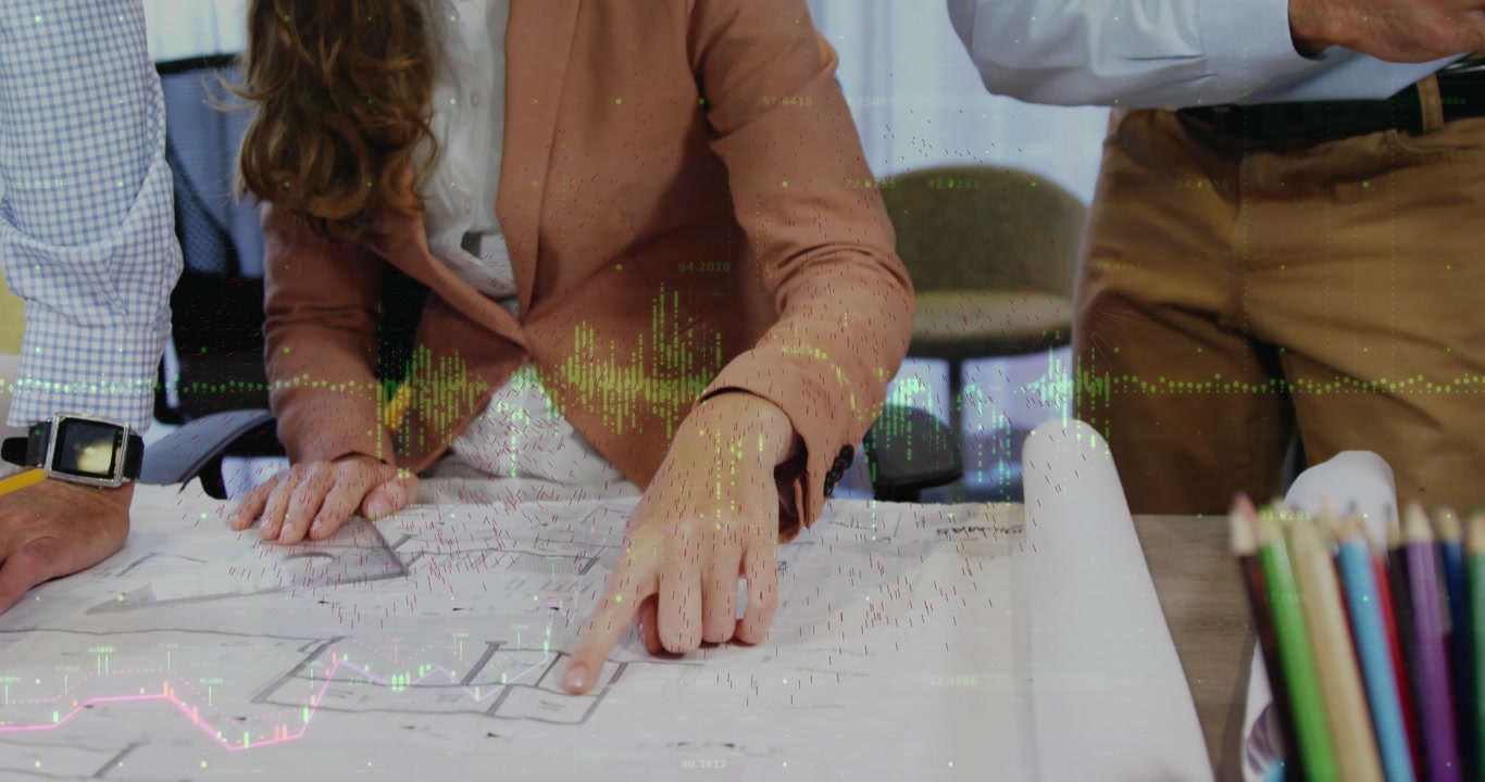 Business Team Discussing Blueprints with Digital Data Overlay