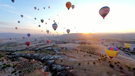watch the cappadocian landscape come alive from above as you soar in a sunrise hot air balloon.
