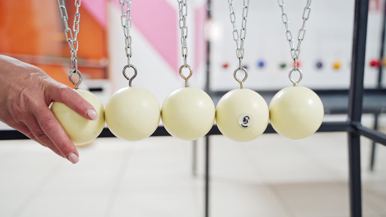 Newton's cradle. Museum of Sciences