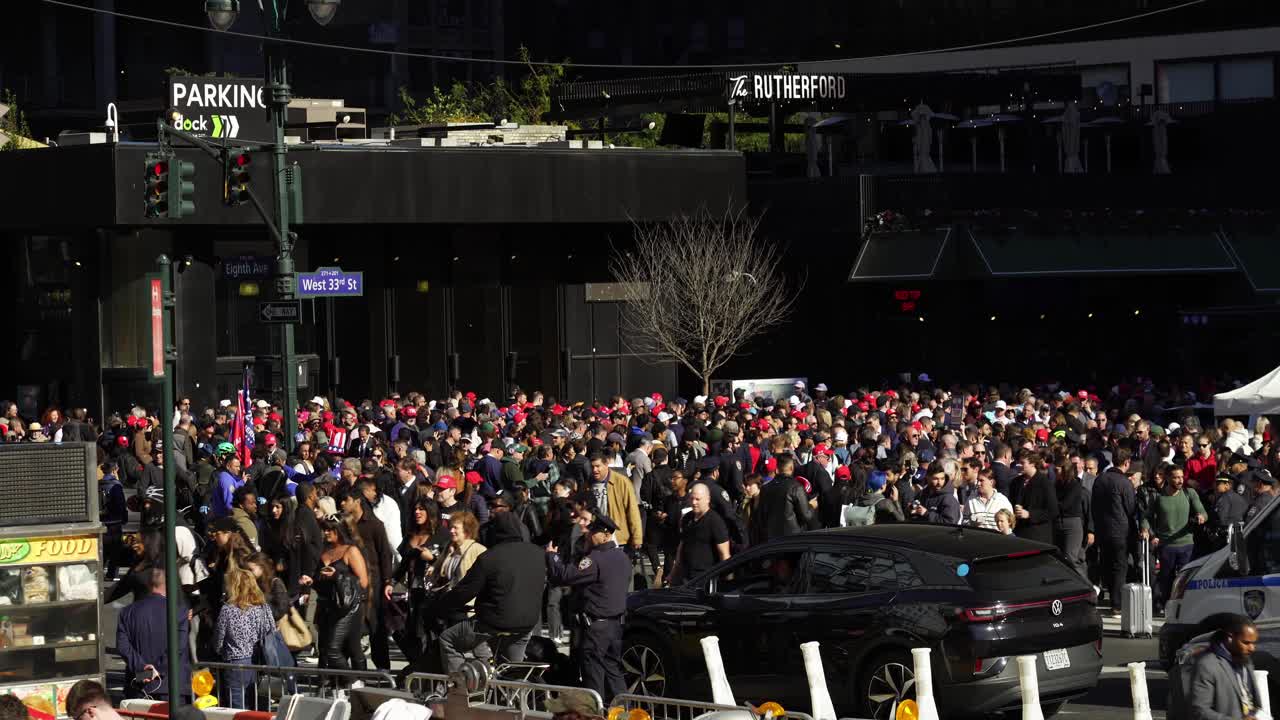 Under the bright sun, Trump’s supporters fill the space around Madison Square Garden, their presence a show of solidarity