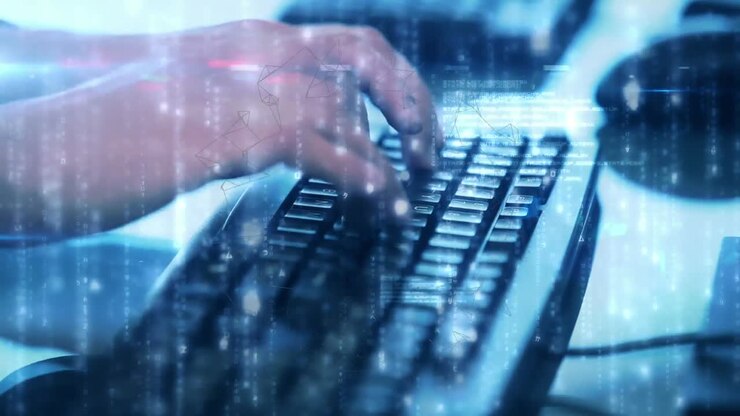 Animation of glowing light trails over computer keyboard