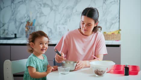 A Heartwarming Moment of Connection: A Parent and Child Bonding Over Baking in a Cozy Kitchen, Creating Sweet Memories Together