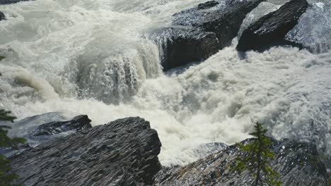 A-small-water-fall-in-Yoho-National-Park,-water-flowing-over-rocks-in-canada