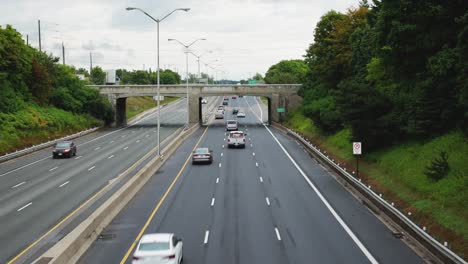 shot of low traffic on highway from bridge