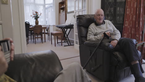 Elderly Couple Relaxing at Home