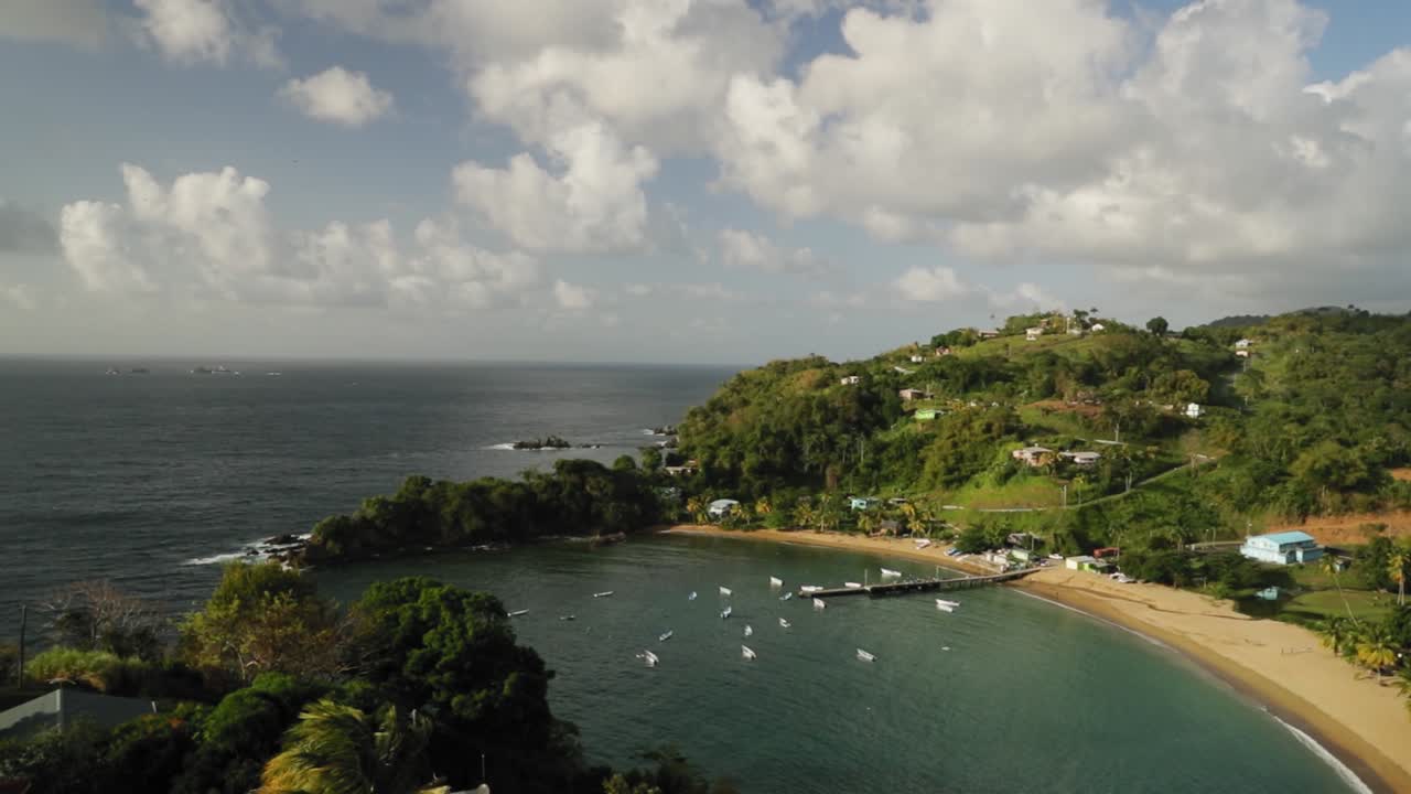Beautiful view overlooking a fishing village and ocean bay in Tobago