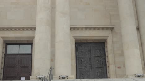 Grand-and-monumental-columns,-doors,-and-stairs-of-a-renovated-church-in-Central-Europe,-captured-dynamically-in-4K-resolution