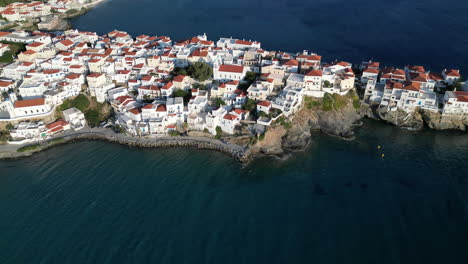 Aerial-drone-footage-of-iconic-and-picturesque-Andros-island-chora,-Cyclades,-Greece