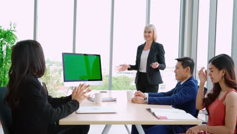 Business-people-in-the-conference-room-with-green-screen