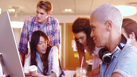 Graphic-designers-working-at-desk