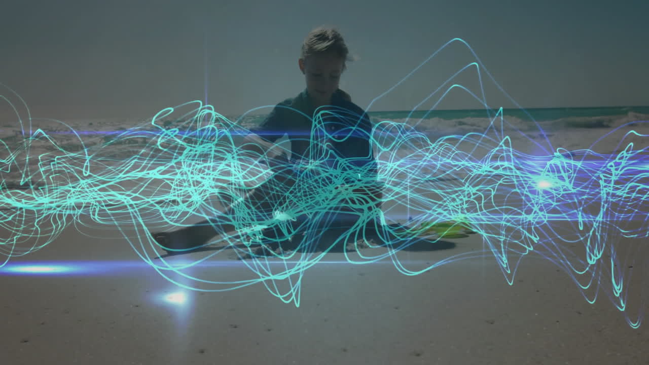 woman exploring technology data on shoreline, with glowing teal wave patterns overlaying her view