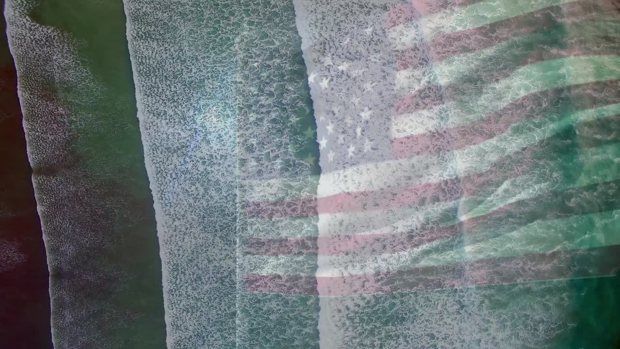 composición digital de agitarnos la bandera contra la vista aérea de las olas del mar