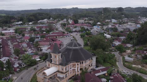 reveal shot of catholic church at waikaboebak sumba island, aerial