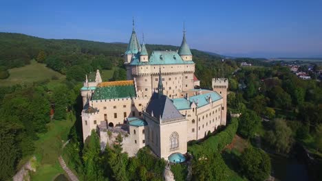 a beautiful aerial establishing view of the romantic bojnice castle in slovakia