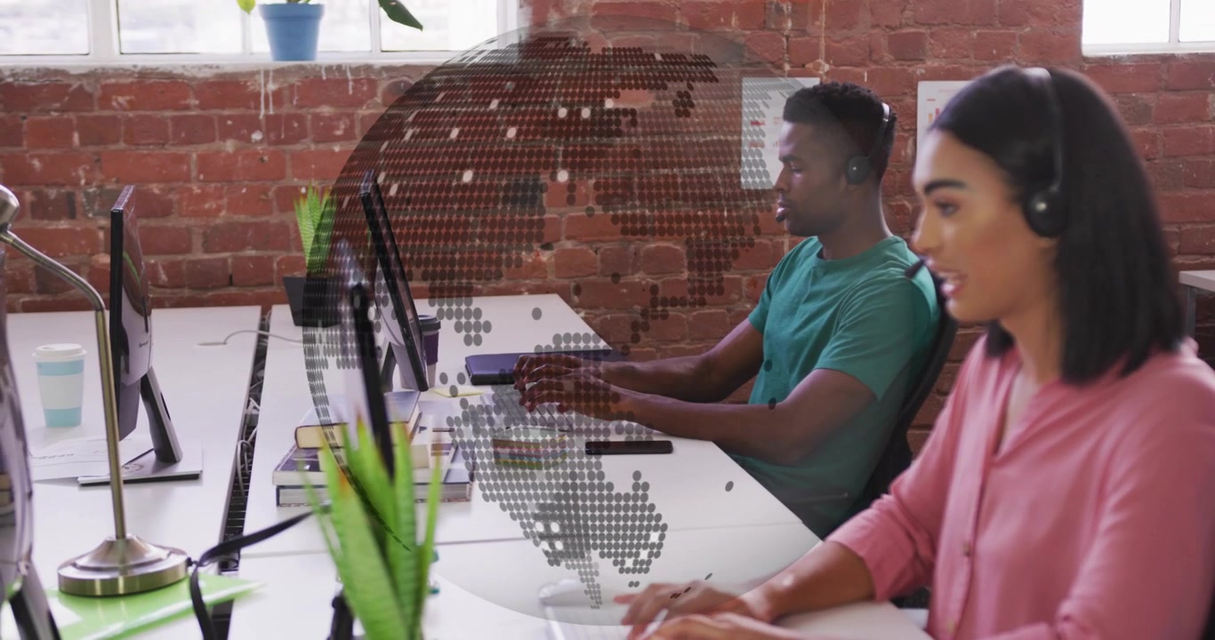 Support duo typing speaking into headset while man answering call, overlay globe partly obscuring