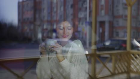 woman enjoying a coffee in a cafe