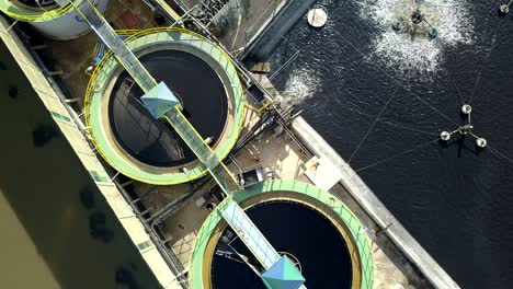 aerial top view 4k of waste water treatment system in industrial estate