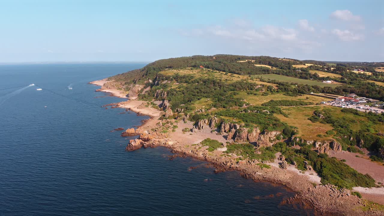 Hovs hallar nature reserve coastline, showcasing cliffs and ocean, aerial view