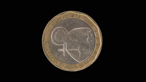 Bulgaria 2002 one lev coin obverse featuring Saint Ivan Rilski rotating on black background