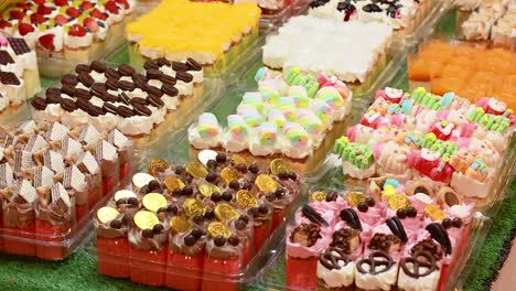 vibrant desserts displayed at bangkok's floating market