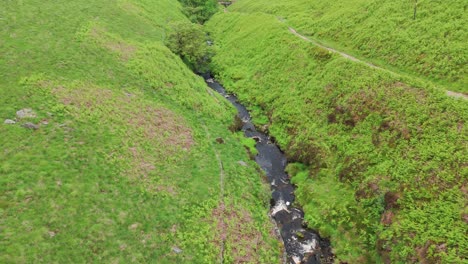 Dane-river-water-flowing-through-narrow-way-in-Dane-Valley-of-England