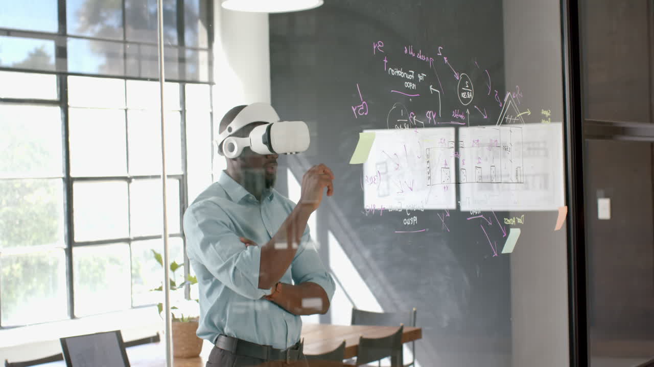 Using VR headset, businessman analyzing data on sticky note in modern office