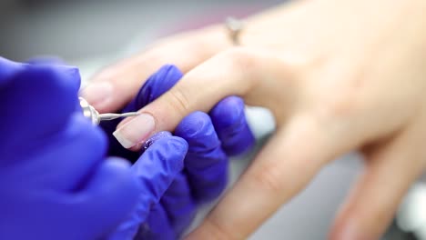 manicure done by a professional manicurist in slow motion